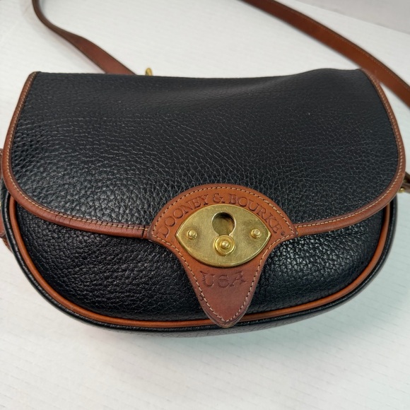 Dooney & Bourke Handbags - Vintage Dooney & Bourke AWL Black & Tan Leather Crossbody Cavalry / Saddle Bag